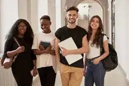 Four young people holding documents and bags